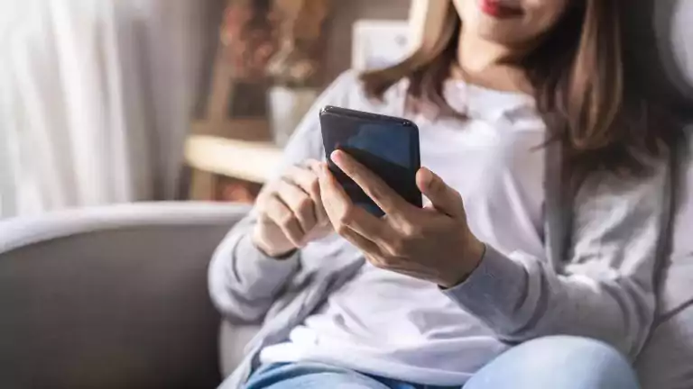 Young woman lying on sofa