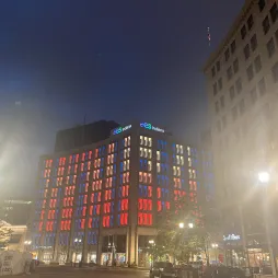 WNBA lights on aes building 